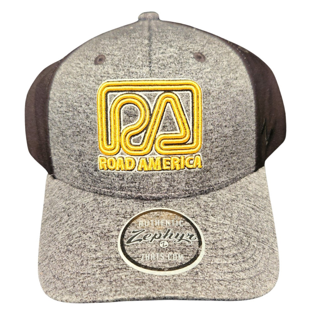 The Kendrick Hat has a light heather gray front and visor. The Road America logo is embroidered center front. The back is black breathable mesh with a snap-back closure.
