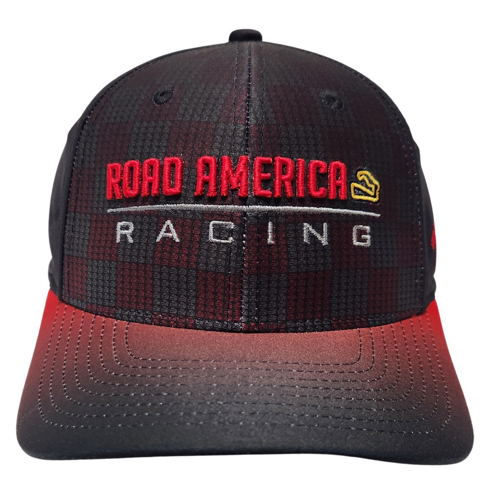 The words ROAD AMERICA and RACING are embroidered in red and gray on the front of the RA Racing Hat. The hat is gray and red checker patterned. It also features a track outline stitched in yellow on the hat front and again near the snap-back closure.