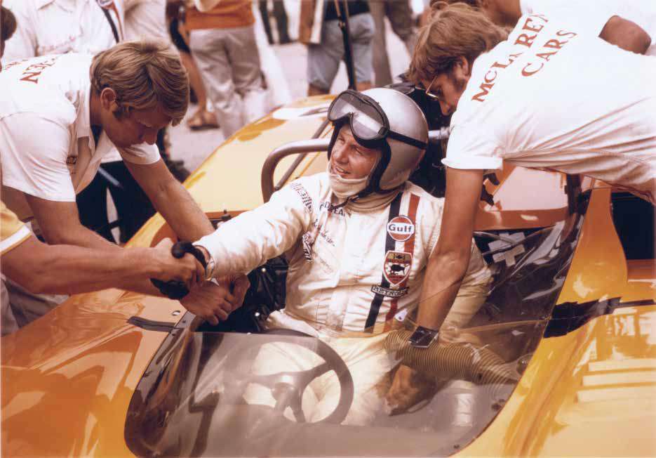 1969 CAN-AM: Bruce McLaren with Crew Banner